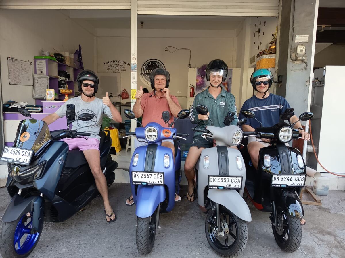 Group of riders with their rental motorbikes at Lucky Rental shop